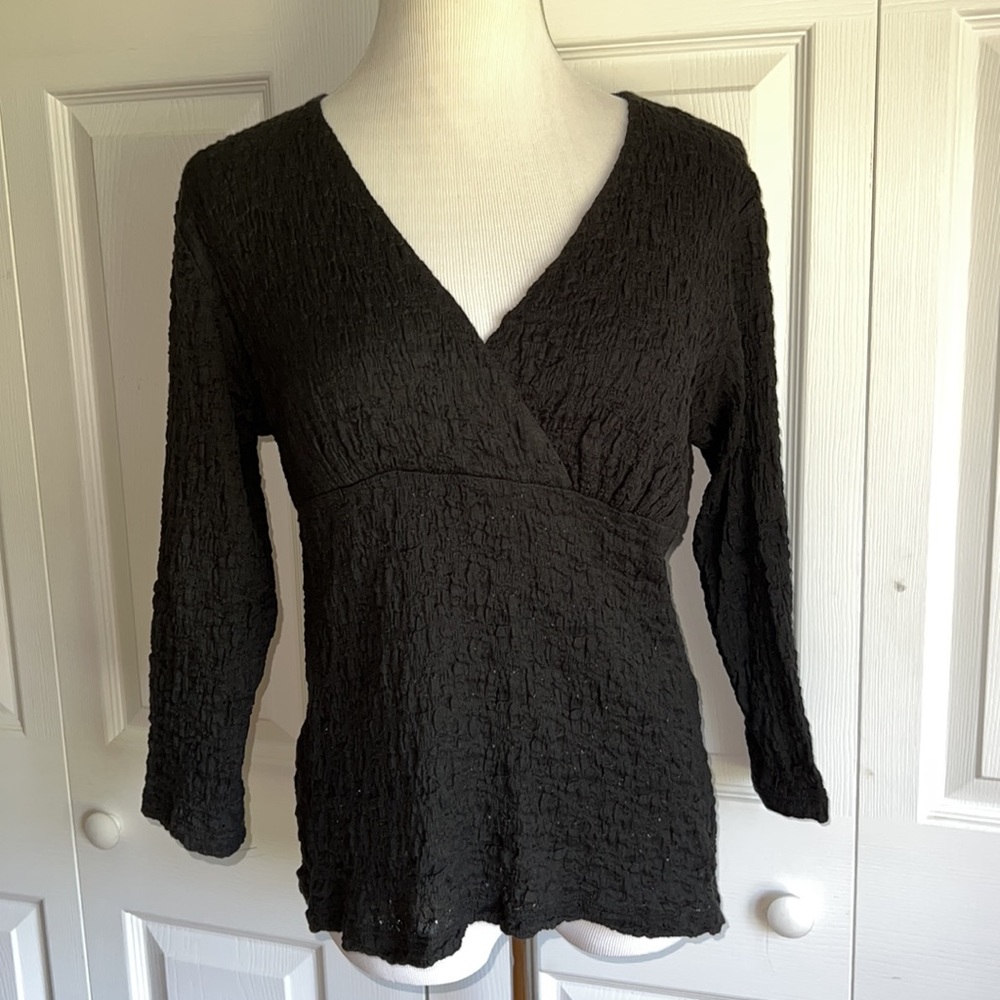 Nomadic Traders black textured top with three quarter sleeves